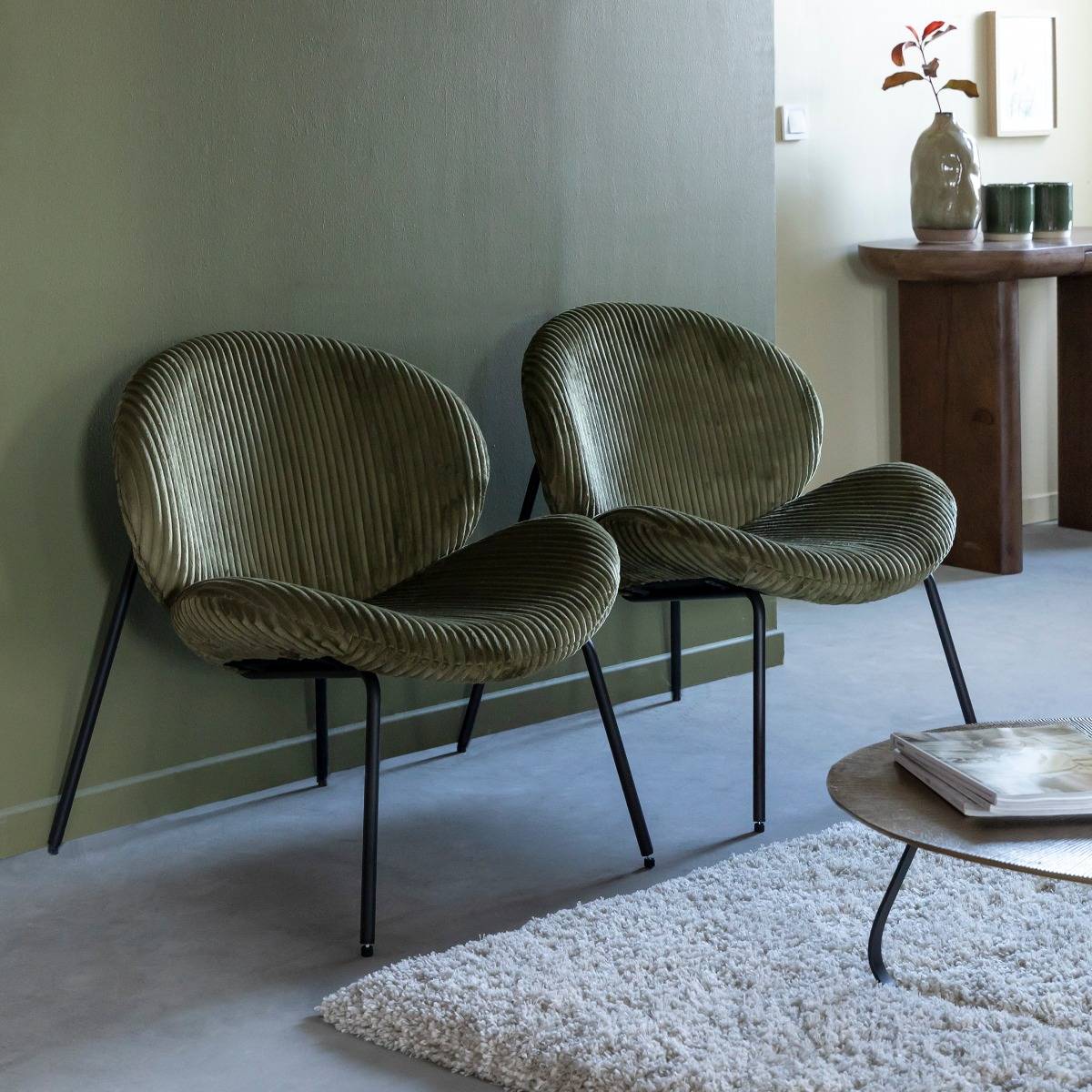 Fauteuil en velours vert Kanoa