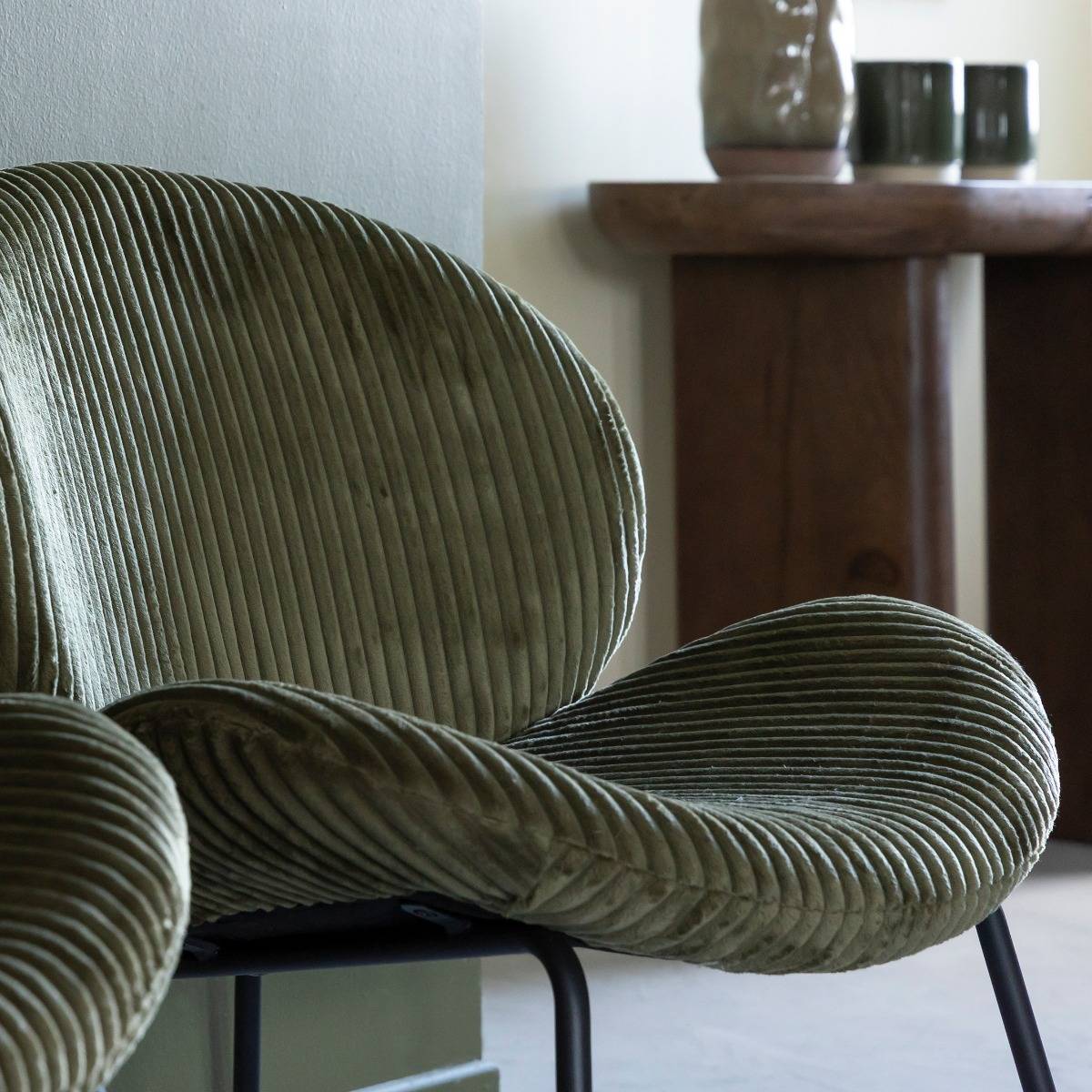 Fauteuil en velours vert Kanoa