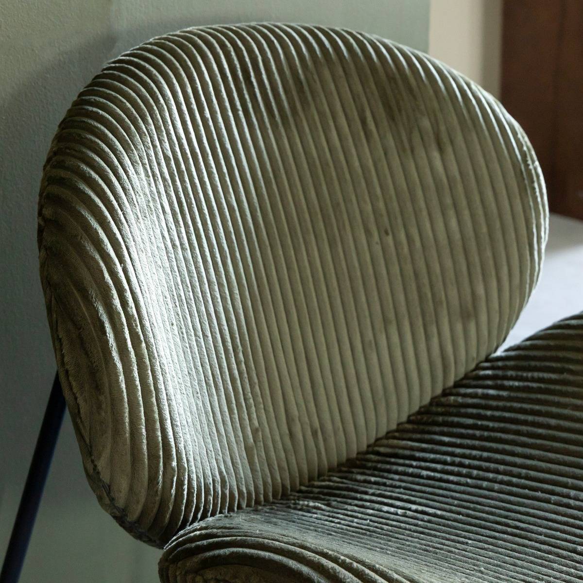 Fauteuil en velours vert Kanoa