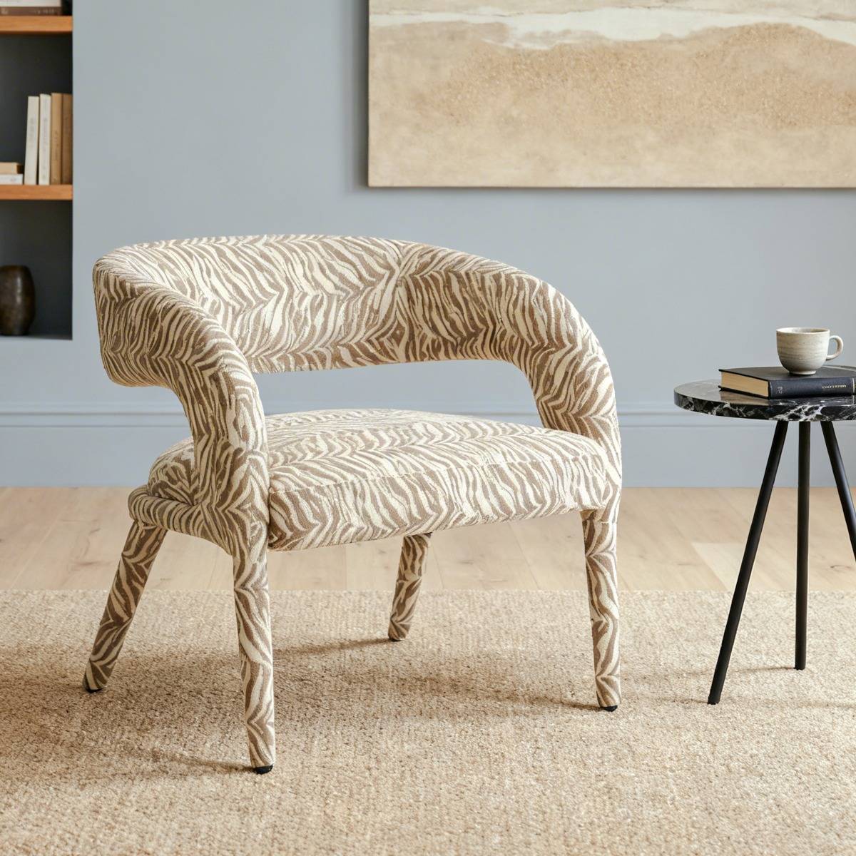 Fauteuil en tissu à motif zèbre Indira