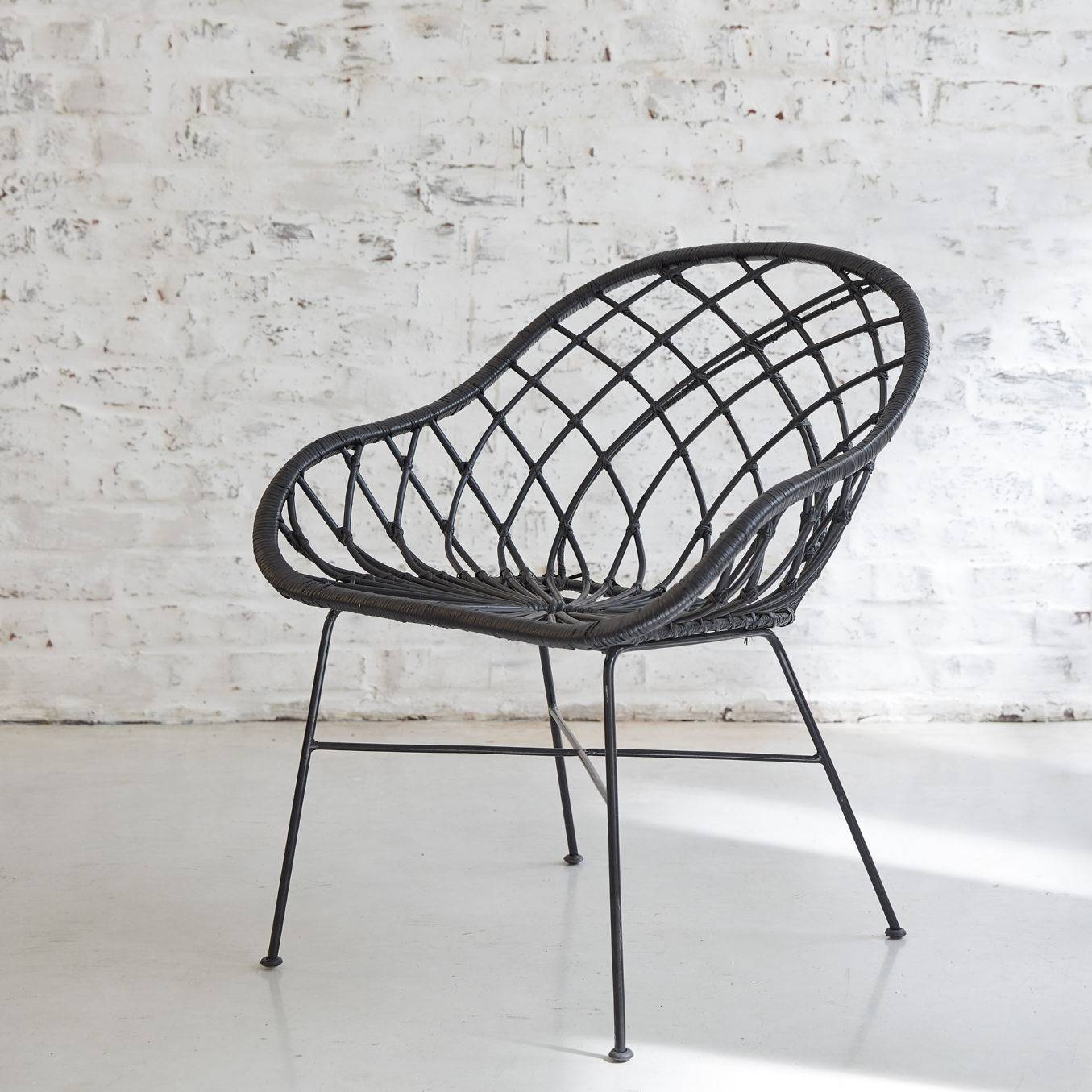 fauteuil tressé rotin noir